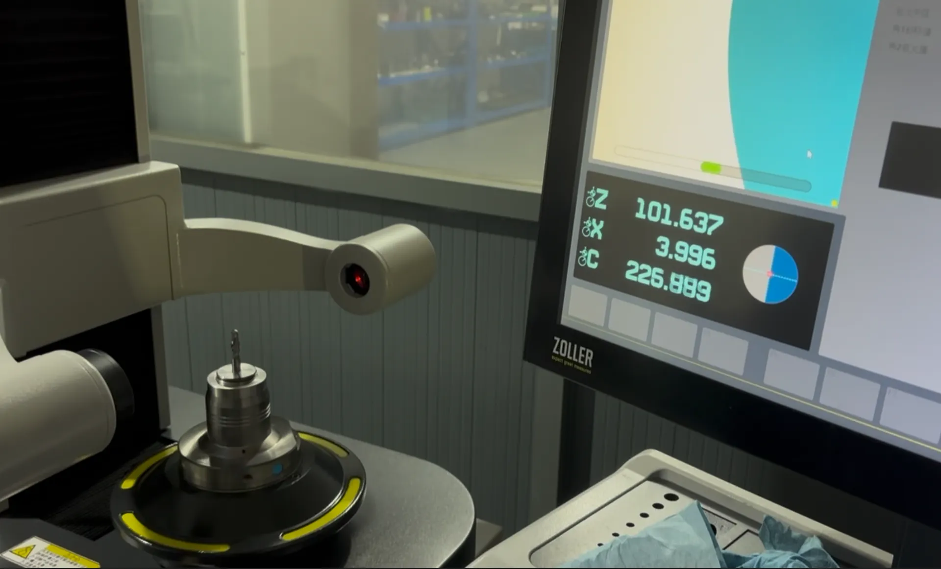 ZOLLER optical measurement system inspecting graphite end mill dimensions